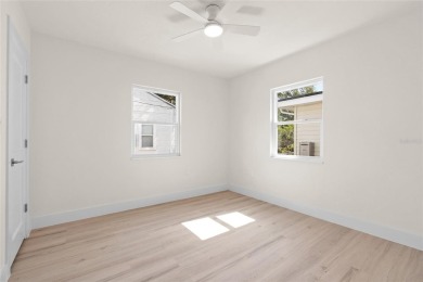Under contract-accepting backup offers. Lakeview home in on The Dunedin Country Club in Florida - for sale on GolfHomes.com, golf home, golf lot