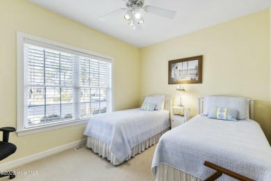 A stunning first floor condo in the Osprey Creek section of Sea on Sea Trail Golf Resort in North Carolina - for sale on GolfHomes.com, golf home, golf lot