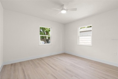 Under contract-accepting backup offers. Lakeview home in on The Dunedin Country Club in Florida - for sale on GolfHomes.com, golf home, golf lot