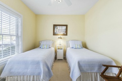 A stunning first floor condo in the Osprey Creek section of Sea on Sea Trail Golf Resort in North Carolina - for sale on GolfHomes.com, golf home, golf lot
