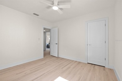 Under contract-accepting backup offers. Lakeview home in on The Dunedin Country Club in Florida - for sale on GolfHomes.com, golf home, golf lot