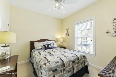 A stunning first floor condo in the Osprey Creek section of Sea on Sea Trail Golf Resort in North Carolina - for sale on GolfHomes.com, golf home, golf lot