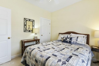 A stunning first floor condo in the Osprey Creek section of Sea on Sea Trail Golf Resort in North Carolina - for sale on GolfHomes.com, golf home, golf lot