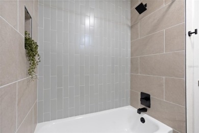 Under contract-accepting backup offers. Lakeview home in on The Dunedin Country Club in Florida - for sale on GolfHomes.com, golf home, golf lot