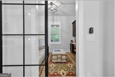 Experience elegance and privacy in this immaculate 4-bedroom, 3 on Harbor Club Golf and Country Club in Georgia - for sale on GolfHomes.com, golf home, golf lot