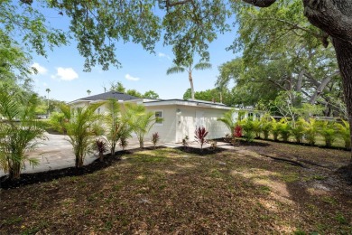 Under contract-accepting backup offers. Lakeview home in on The Dunedin Country Club in Florida - for sale on GolfHomes.com, golf home, golf lot