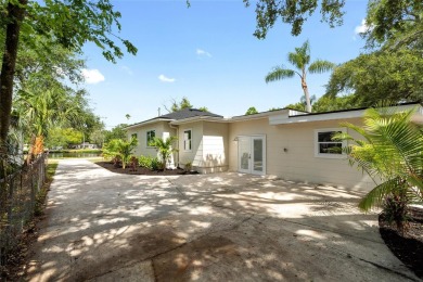 Under contract-accepting backup offers. Lakeview home in on The Dunedin Country Club in Florida - for sale on GolfHomes.com, golf home, golf lot