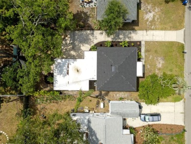 Under contract-accepting backup offers. Lakeview home in on The Dunedin Country Club in Florida - for sale on GolfHomes.com, golf home, golf lot