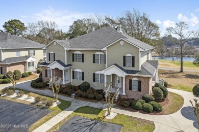 A stunning first floor condo in the Osprey Creek section of Sea on Sea Trail Golf Resort in North Carolina - for sale on GolfHomes.com, golf home, golf lot