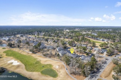 A stunning first floor condo in the Osprey Creek section of Sea on Sea Trail Golf Resort in North Carolina - for sale on GolfHomes.com, golf home, golf lot