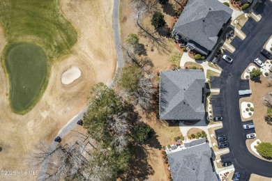 A stunning first floor condo in the Osprey Creek section of Sea on Sea Trail Golf Resort in North Carolina - for sale on GolfHomes.com, golf home, golf lot