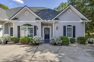 Location, location, location! This beautiful custom-built home on Toqua Golf Course - Loudon County in Tennessee - for sale on GolfHomes.com, golf home, golf lot