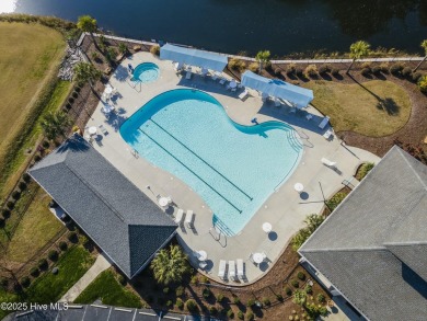 A stunning first floor condo in the Osprey Creek section of Sea on Sea Trail Golf Resort in North Carolina - for sale on GolfHomes.com, golf home, golf lot