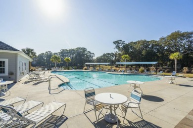 A stunning first floor condo in the Osprey Creek section of Sea on Sea Trail Golf Resort in North Carolina - for sale on GolfHomes.com, golf home, golf lot
