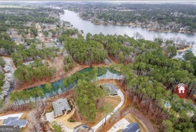 Experience elegance and privacy in this immaculate 4-bedroom, 3 on Harbor Club Golf and Country Club in Georgia - for sale on GolfHomes.com, golf home, golf lot