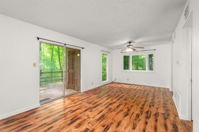 Main level includes living/dining room, kitchen and half bath on DeSoto Golf Course in Arkansas - for sale on GolfHomes.com, golf home, golf lot
