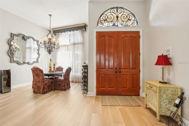 Prepare to live the ultimate Florida lifestyle in this on Hunters Green Country Club in Florida - for sale on GolfHomes.com, golf home, golf lot