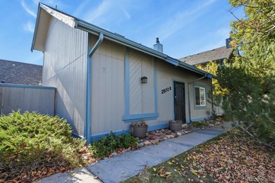 Beautifully updated townhome overlooking the 11th-hole fairway on Golf Club At Heather Ridge in Colorado - for sale on GolfHomes.com, golf home, golf lot