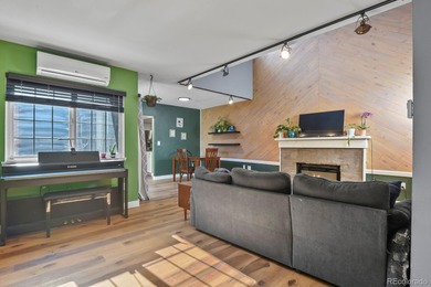 Beautifully updated townhome overlooking the 11th-hole fairway on Golf Club At Heather Ridge in Colorado - for sale on GolfHomes.com, golf home, golf lot