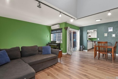 Beautifully updated townhome overlooking the 11th-hole fairway on Golf Club At Heather Ridge in Colorado - for sale on GolfHomes.com, golf home, golf lot