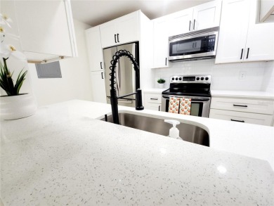 One or more photos is virtually staged!**PRIDE OF OWNERSHIP ( 24 on Cove Cay Country Club in Florida - for sale on GolfHomes.com, golf home, golf lot