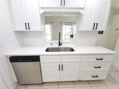 One or more photos is virtually staged!**PRIDE OF OWNERSHIP ( 24 on Cove Cay Country Club in Florida - for sale on GolfHomes.com, golf home, golf lot
