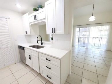 One or more photos is virtually staged!**PRIDE OF OWNERSHIP ( 24 on Cove Cay Country Club in Florida - for sale on GolfHomes.com, golf home, golf lot