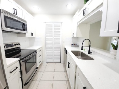 One or more photos is virtually staged!**PRIDE OF OWNERSHIP ( 24 on Cove Cay Country Club in Florida - for sale on GolfHomes.com, golf home, golf lot