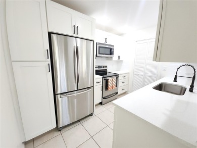 One or more photos is virtually staged!**PRIDE OF OWNERSHIP ( 24 on Cove Cay Country Club in Florida - for sale on GolfHomes.com, golf home, golf lot