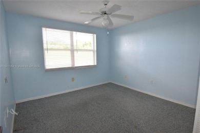 Spacious 2-bedroom 2 bath condo offers a good size kitchen with on Sunrise Lakes Phase IV Golf Course in Florida - for sale on GolfHomes.com, golf home, golf lot