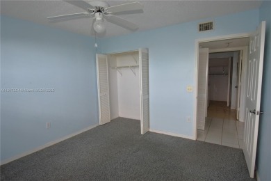Spacious 2-bedroom 2 bath condo offers a good size kitchen with on Sunrise Lakes Phase IV Golf Course in Florida - for sale on GolfHomes.com, golf home, golf lot