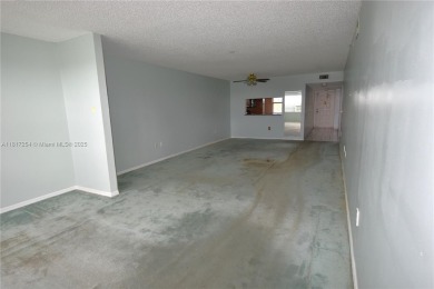 Spacious 2-bedroom 2 bath condo offers a good size kitchen with on Sunrise Lakes Phase IV Golf Course in Florida - for sale on GolfHomes.com, golf home, golf lot