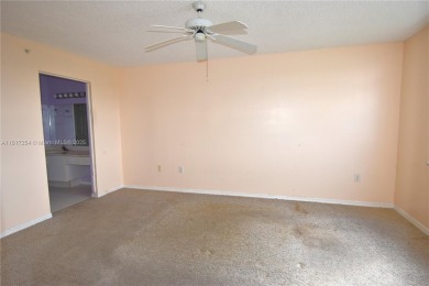 Spacious 2-bedroom 2 bath condo offers a good size kitchen with on Sunrise Lakes Phase IV Golf Course in Florida - for sale on GolfHomes.com, golf home, golf lot