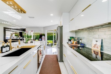 Located on a corner lot in PGA, this updated 3BR/3BA home offers on PGA National Golf Club in Florida - for sale on GolfHomes.com, golf home, golf lot