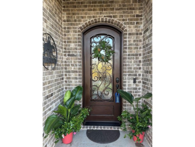 This exquisite four bedroom three bath Al Couto home boasts on Harbor Lakes Golf Club in Texas - for sale on GolfHomes.com, golf home, golf lot