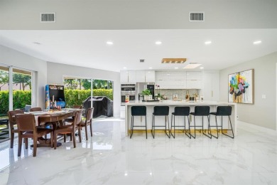 Located on a corner lot in PGA, this updated 3BR/3BA home offers on PGA National Golf Club in Florida - for sale on GolfHomes.com, golf home, golf lot