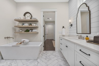A rare blend of modern luxury and timeless design, this custom on Plantation at Ponte Vedra in Florida - for sale on GolfHomes.com, golf home, golf lot
