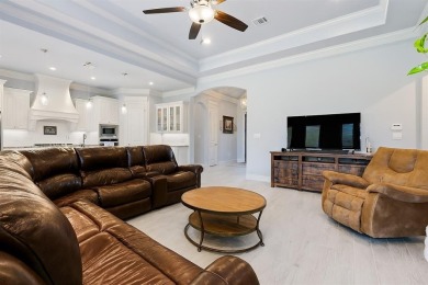 This exquisite four bedroom three bath Al Couto home boasts on Harbor Lakes Golf Club in Texas - for sale on GolfHomes.com, golf home, golf lot