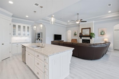 This exquisite four bedroom three bath Al Couto home boasts on Harbor Lakes Golf Club in Texas - for sale on GolfHomes.com, golf home, golf lot