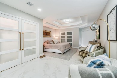 Located on a corner lot in PGA, this updated 3BR/3BA home offers on PGA National Golf Club in Florida - for sale on GolfHomes.com, golf home, golf lot