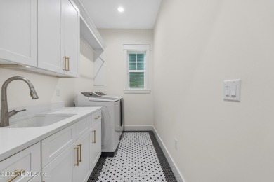 A rare blend of modern luxury and timeless design, this custom on Plantation at Ponte Vedra in Florida - for sale on GolfHomes.com, golf home, golf lot