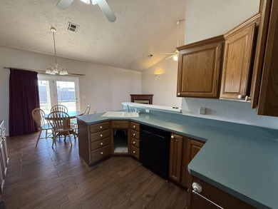 Located adjacent to Woodward Municipal Golf Course, this 1820 on Woodward Municipal Golf Course in Oklahoma - for sale on GolfHomes.com, golf home, golf lot