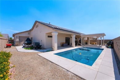 Welcome to this beautifully maintained 3-bedroom, 2-bath POOL on Desert Lakes Golf Course in Arizona - for sale on GolfHomes.com, golf home, golf lot