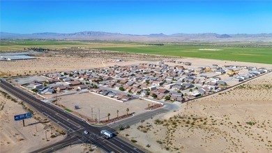 Welcome to this beautifully maintained 3-bedroom, 2-bath POOL on Desert Lakes Golf Course in Arizona - for sale on GolfHomes.com, golf home, golf lot