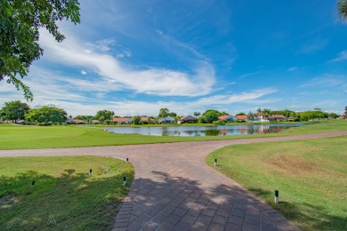 Country Club Living at its Finest! Boca Woods Country Club on Boca Woods Country Club in Florida - for sale on GolfHomes.com, golf home, golf lot