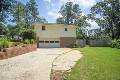 At 101 Vivion Drive, you will find a delightful 3-4 bedroom home on Houndslake Country Club in South Carolina - for sale on GolfHomes.com, golf home, golf lot
