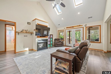 Don't miss out on this incredible canal-front home situated on on Duck Woods Country Club in North Carolina - for sale on GolfHomes.com, golf home, golf lot