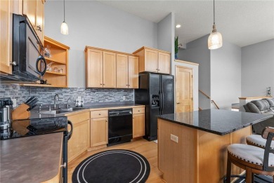 Spring into this wonderful END UNIT townhome.  WINDOWS on 3 on Boulder Pointe Golf Club in Minnesota - for sale on GolfHomes.com, golf home, golf lot