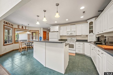 Don't miss out on this incredible canal-front home situated on on Duck Woods Country Club in North Carolina - for sale on GolfHomes.com, golf home, golf lot