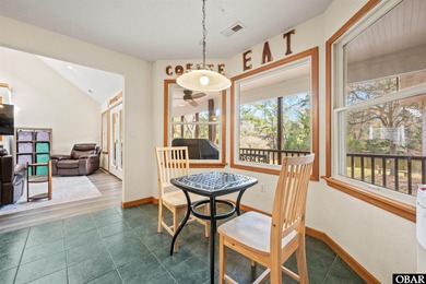 Don't miss out on this incredible canal-front home situated on on Duck Woods Country Club in North Carolina - for sale on GolfHomes.com, golf home, golf lot